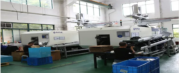Injection molding machines with robot arms